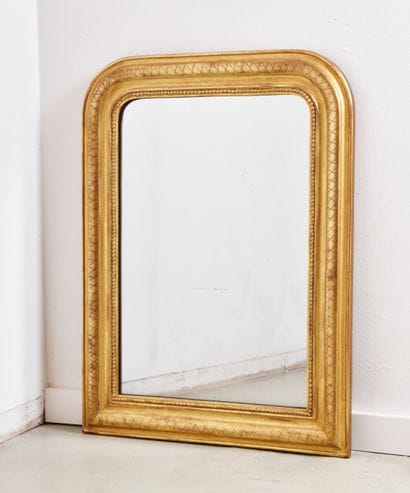 Miroir Louis Philippe, en bois doré décor...