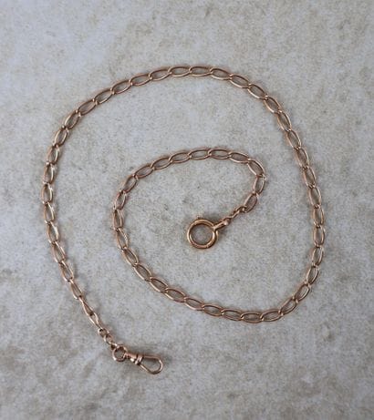 Chaîne de montre de gousset en or rose 18K...