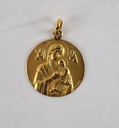 L. TRICARD. Médaille religieuse en or jaune...