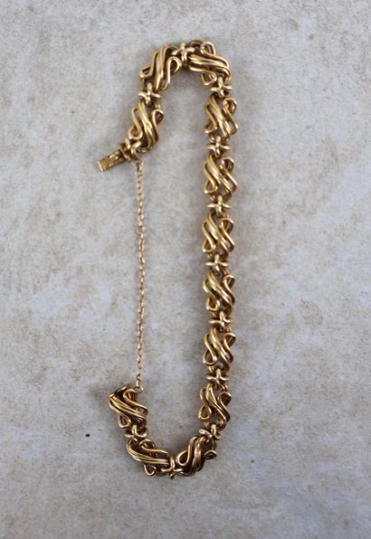 Bracelet en or jaune 18K 750/1000 triplement...