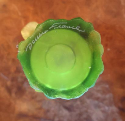 DAUM France
Set in colored glass paste including...