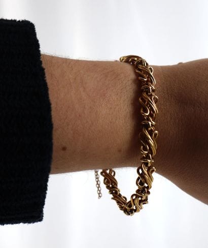 Bracelet en or jaune 18K 750/1000 triplement...