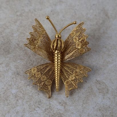 Broche papillon en or 18K 750/1000 filigrané,...