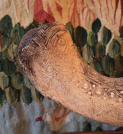 Bone engraved with multiple geometric motifs,...