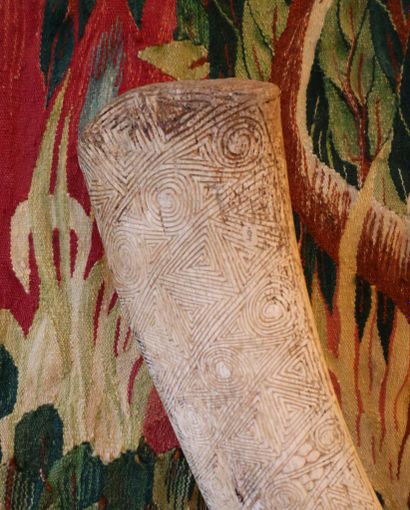 Bone engraved with multiple geometric motifs,...