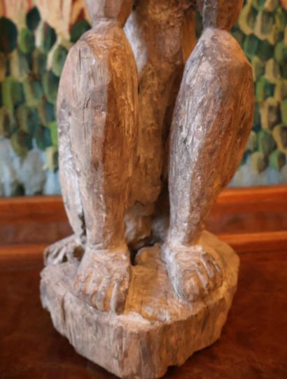 Squatting man, Dogon style
Carved wood sculpture
H....