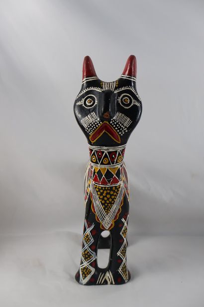 Une poterie en argile en forme de chat et...