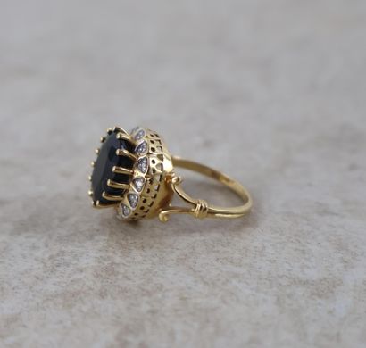 Bague en or jaune 18K (750 ‰), poinçonnée...