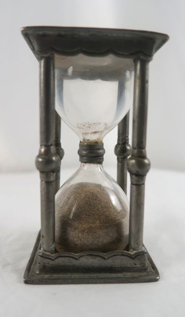 Pewter hourglass with square base and banded...