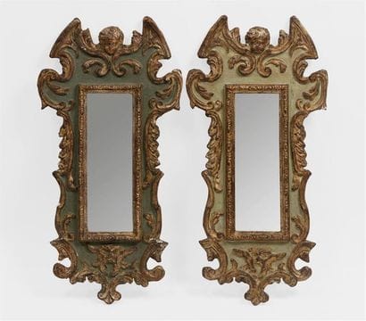 Paire de miroirs de forme chantournée en...
