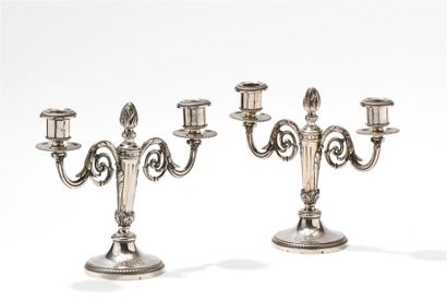 Paire de flambeaux en argent à deux bras...