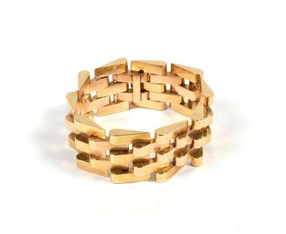 Important bracelet en or jaune 18K à cinq...
