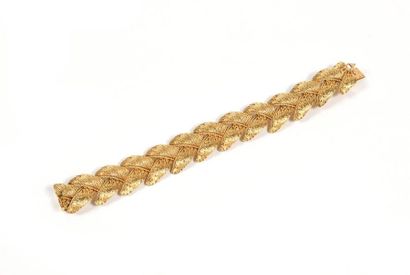 Bracelet en or jaune 18K à maille épis.
XXe.
Poids...