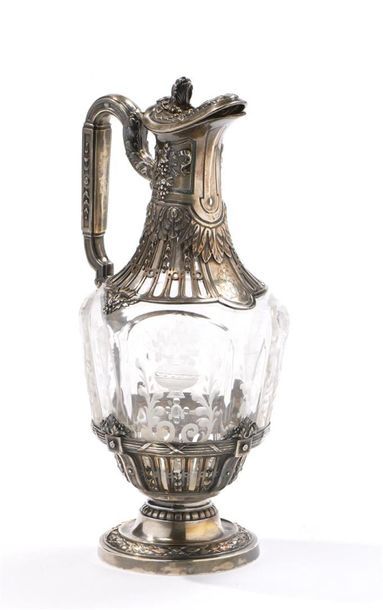 Aiguière en cristal gravé de vases fleuris...