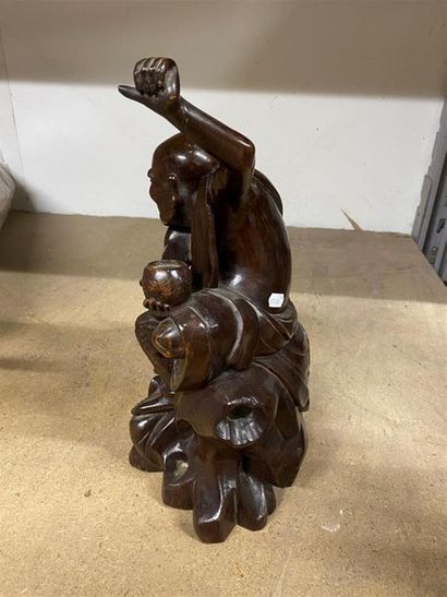 CHINE, XXe.
Statuette de Luohan en bois sculpté,...