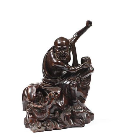 CHINE, XXe.
Statuette de Luohan en bois sculpté,...