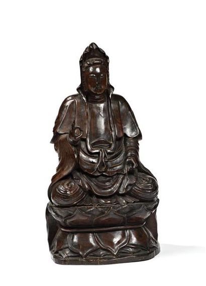 CHINE, XXe.
Statuette de Guanyin en bois...