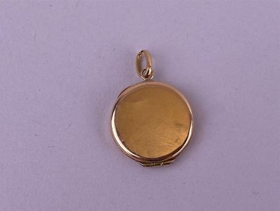 Pendentif reliquaire circulaire en or jaune...