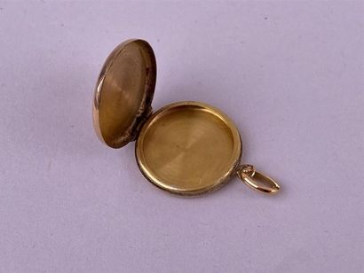Pendentif reliquaire circulaire en or jaune...