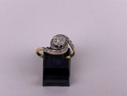 Bague tourbillon en or jaune et gris 18K...