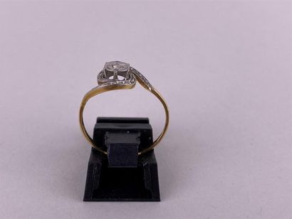 Bague tourbillon en or jaune et gris 18K...