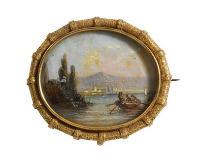 Broche ovale en métal doré, ornée d'une miniature...