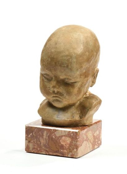École française XXe.
Tête d'enfant endormi.
Sculpture...