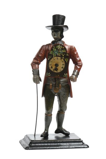 Personnage horloge en régule polychrome supportant...