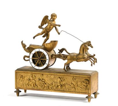 Pendule en bronze ciselé et doré dite au...