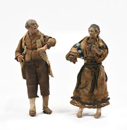 Couple de personnages en bois et terre-cuite...