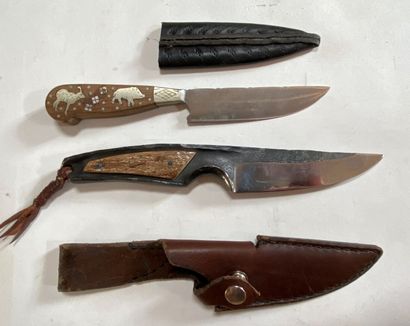 Deux couteaux de chasse, un en fer forgé...