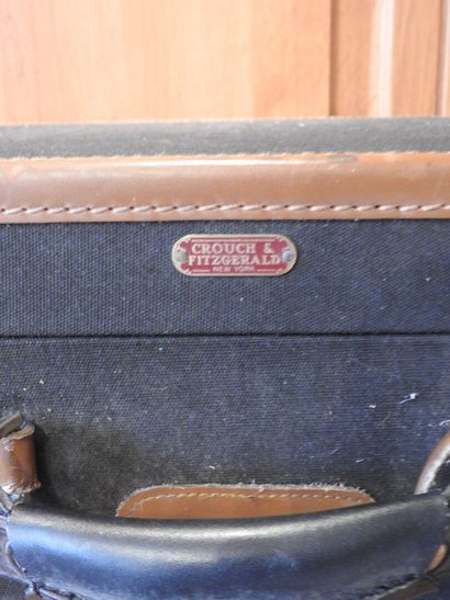 Valise de voyage en toile et cuir de marque...