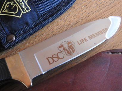 Trois couteaux de chasse dont : Puma Life...