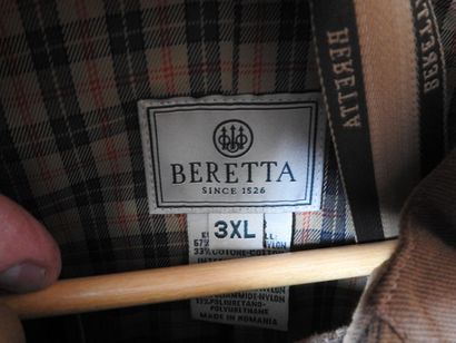 BERETTA.

Veste de chasse en toile marron.

Taille :...