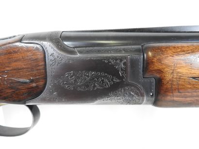 MIROKU brand shotgun with stacked 20 gauge...