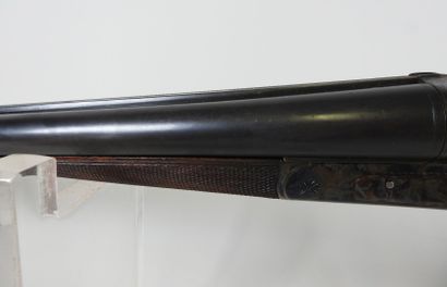 Fusil à canons juxtaposés calibre 16, chambrés...
