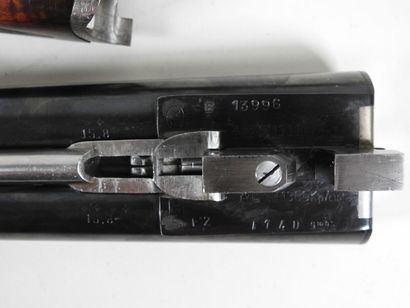 Belle paire de fusils à platines de marque...