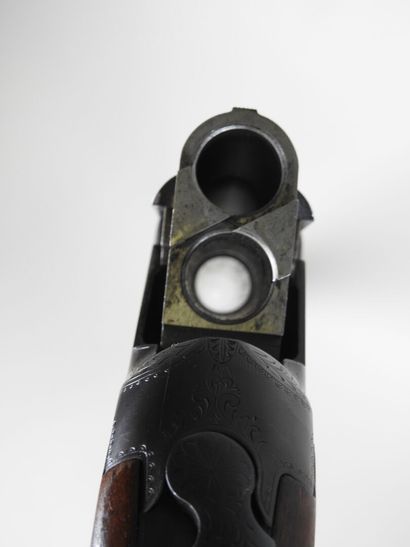 MIROKU brand shotgun with stacked 20 gauge...