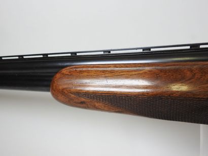 MIROKU brand shotgun with stacked 20 gauge...