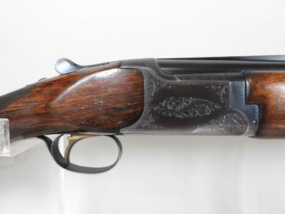 MIROKU brand shotgun with stacked 20 gauge...