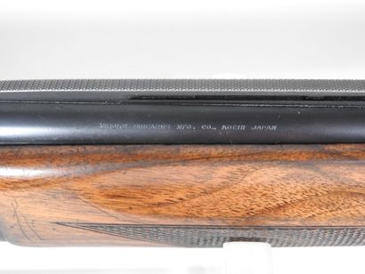 MIROKU brand shotgun with stacked 20 gauge...