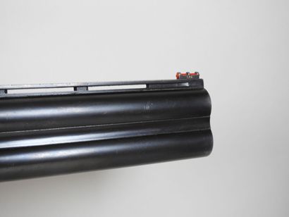 MIROKU brand shotgun with stacked 20 gauge...