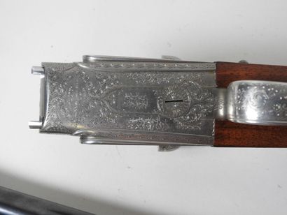 Belle paire de fusils à platines de marque...