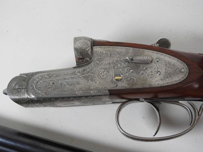 Belle paire de fusils à platines de marque...
