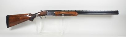 MIROKU brand shotgun with stacked 20 gauge...