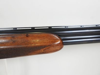 MIROKU brand shotgun with stacked 20 gauge...