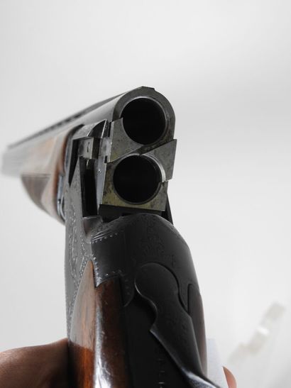 MIROKU brand shotgun with stacked 20 gauge...