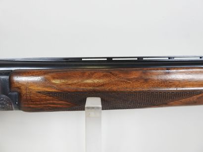MIROKU brand shotgun with stacked 20 gauge...