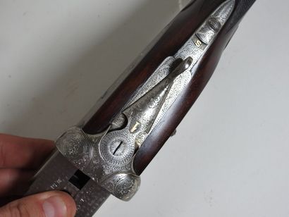 Belle paire de fusils à platines de marque...