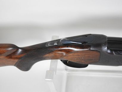 MIROKU brand shotgun with stacked 20 gauge...